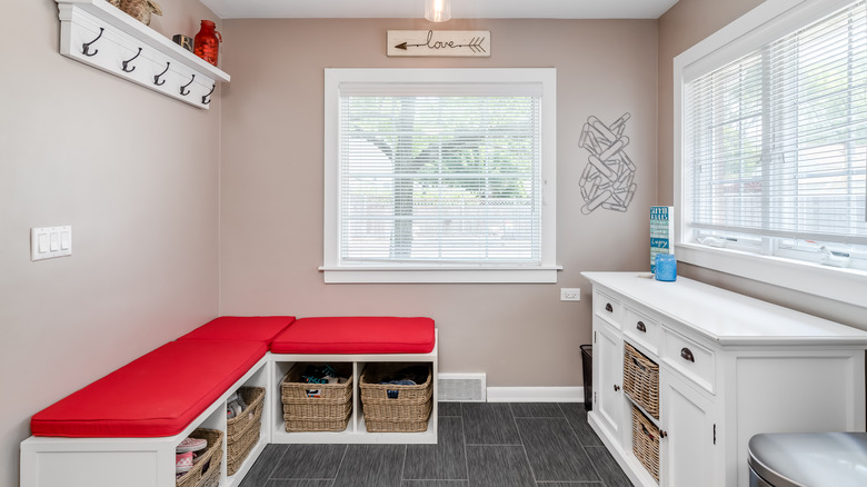 mudroom with white bench