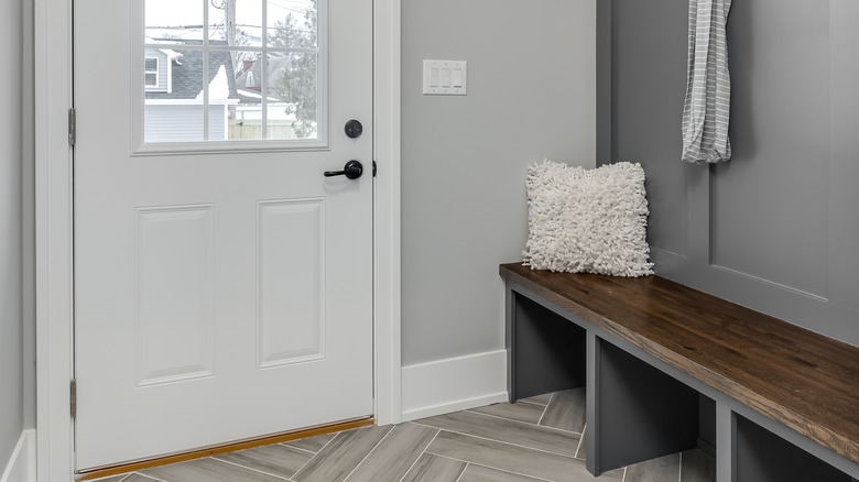 grey mudroom with bench