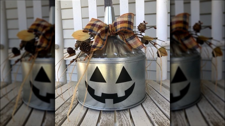 tin decorated as pumpkin