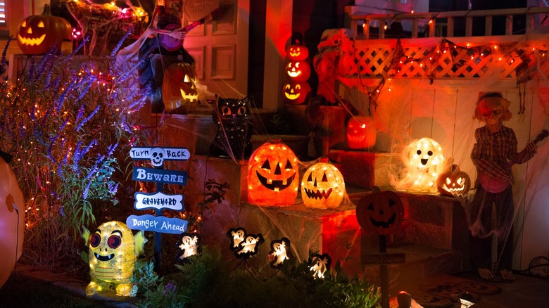 porch lighted with Halloween decorations