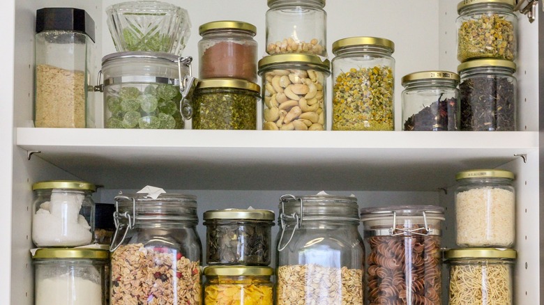 Stacked glass jars in pantry