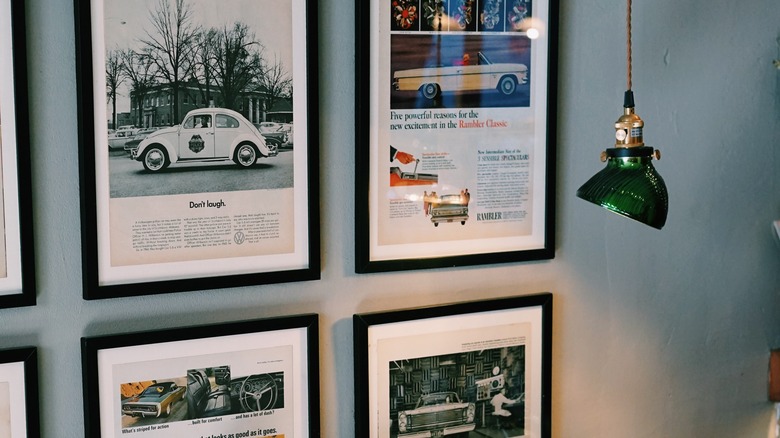 Framed vintage car ads