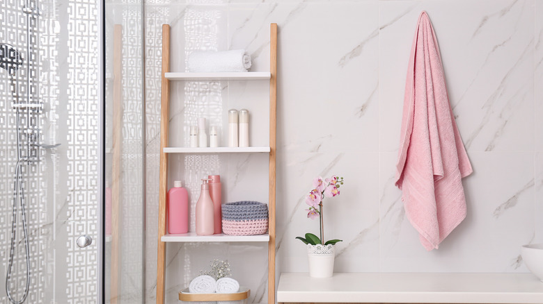 bathroom with pink towel