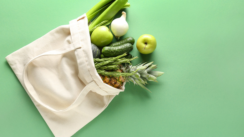 groceries inside reusable white bag