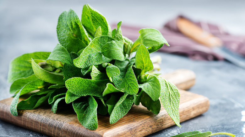 Sage leaves on cutting board