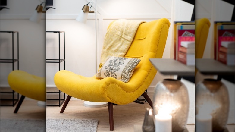 yellow chair in reading nook