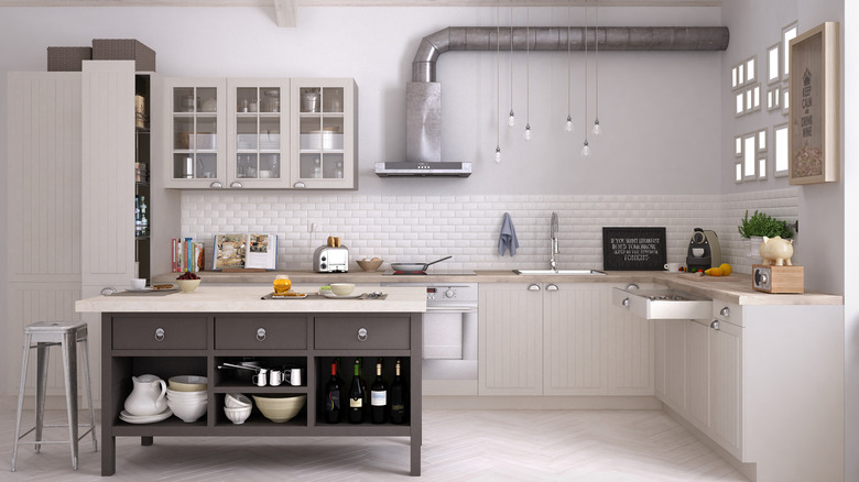 Kitchen with exposed pipes