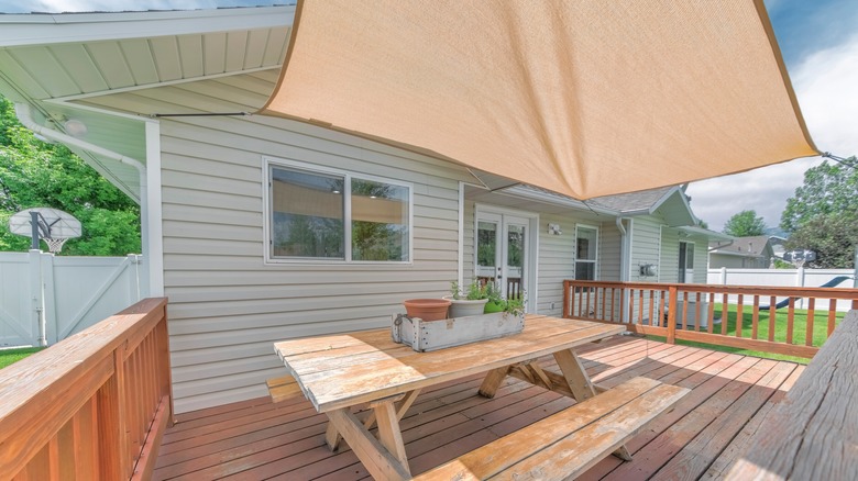 patio with a shade sail