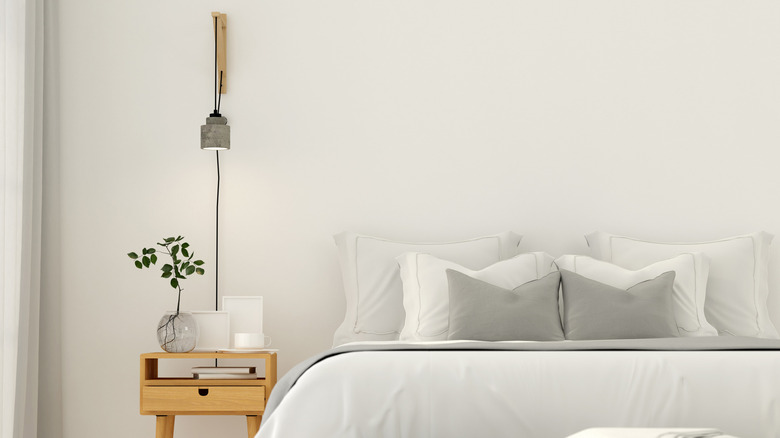 minimalist white and gray bedroom