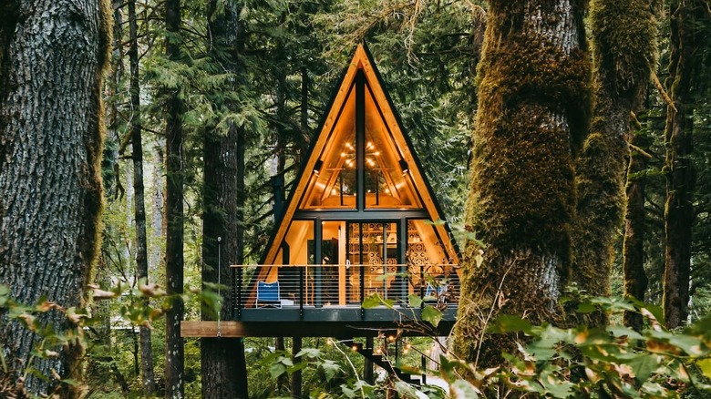 A-frame treehouse with lights