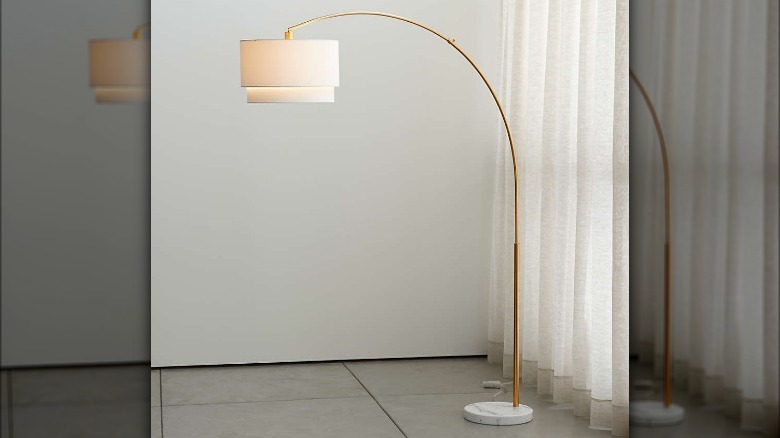 Brass arc floor lamp
