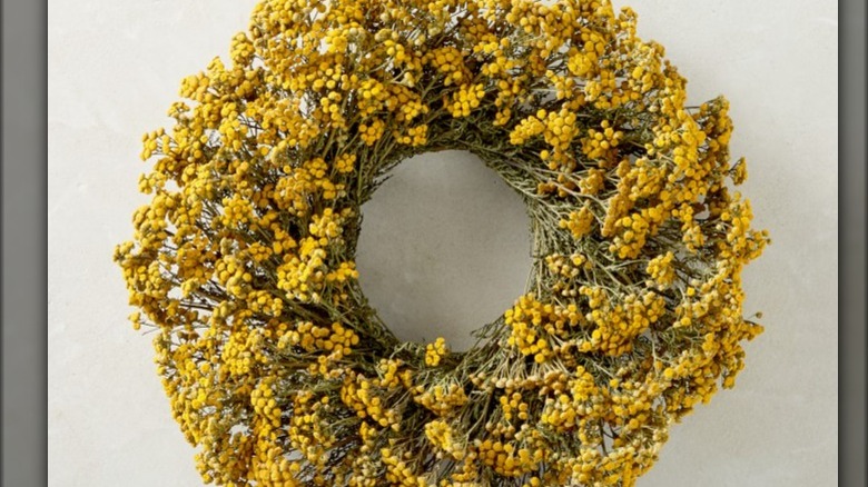 Bright yellow dried wreath