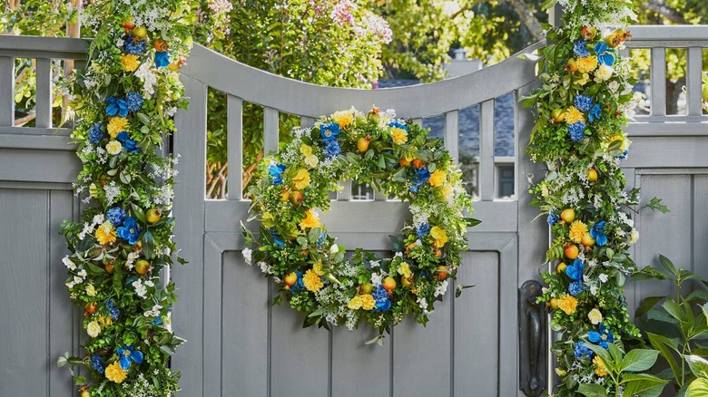 Flower display with blue and yellow flowers