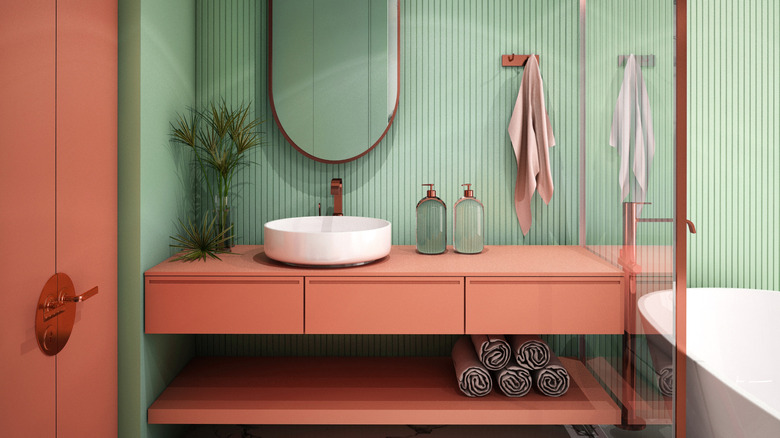 mint and coral bathroom