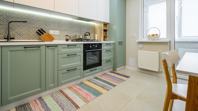 mint green kitchen cabinets