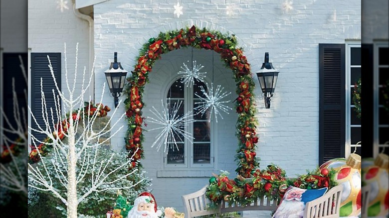 LED spritzers outside festive home