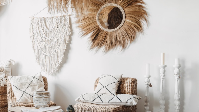 white macramé art on wall