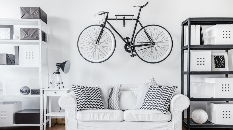 hanging bike above a couch