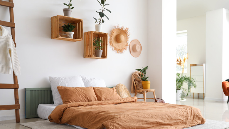 wooden crates hung above bed