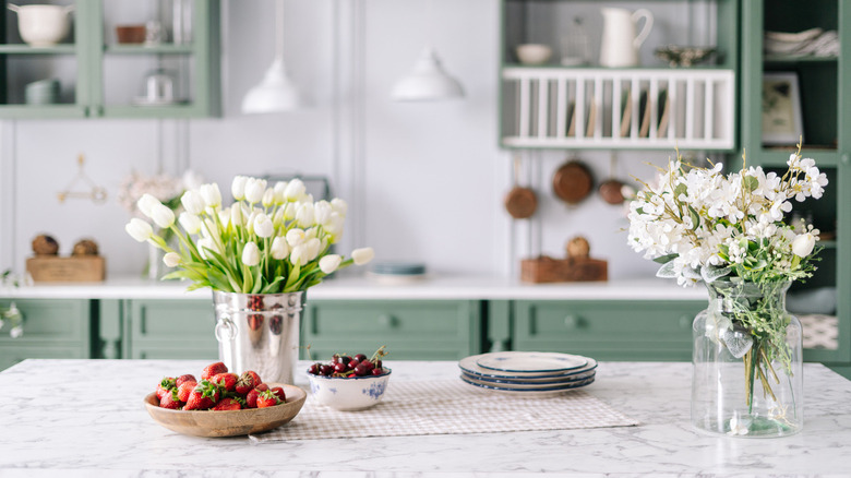 flowers in bouquet and jar