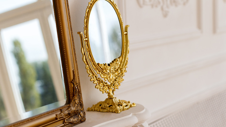 mirrors on mantel