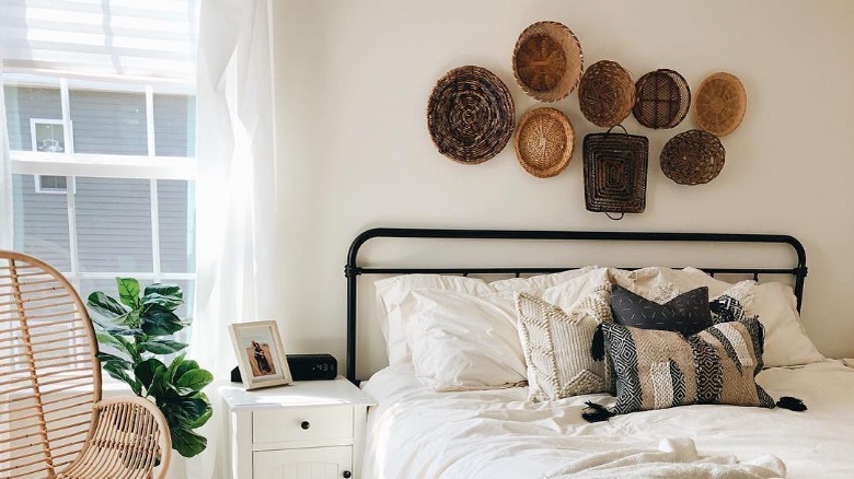 baskets above bed