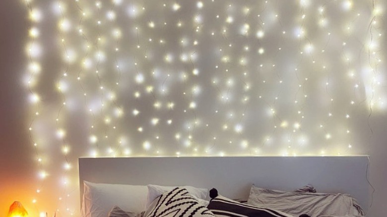 fairy lights behind bed