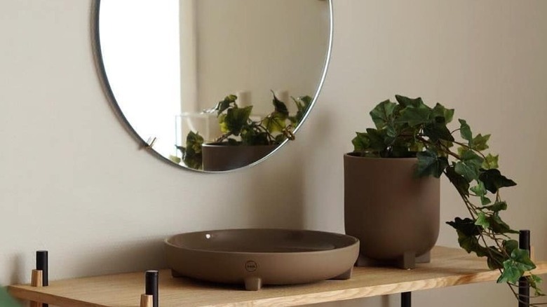 circular mirror on wall