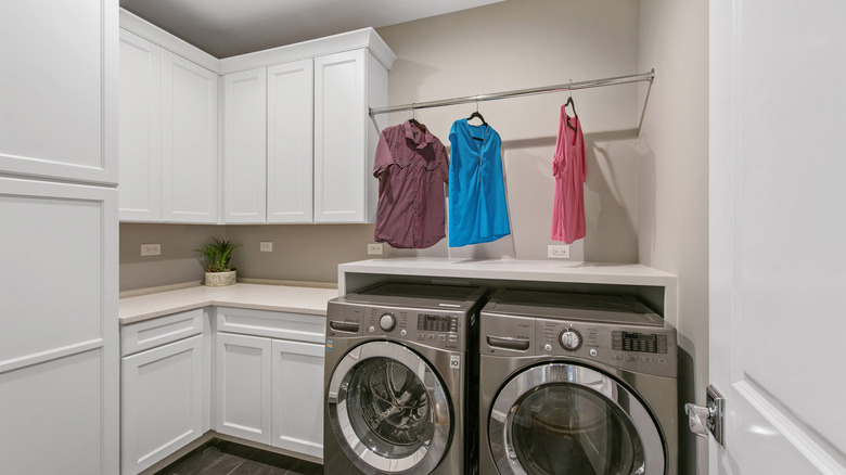 Laundry room with clothing rod