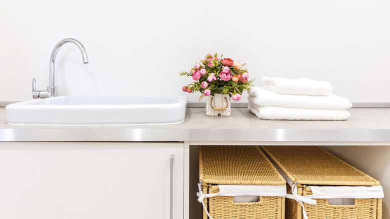 Wicker hampers under countertop