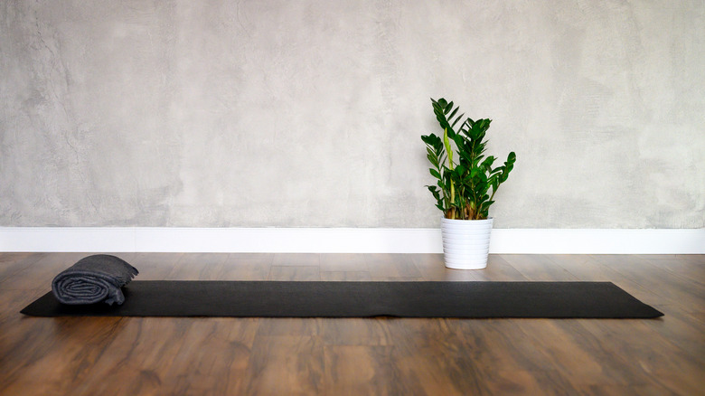 yoga mat in gray room