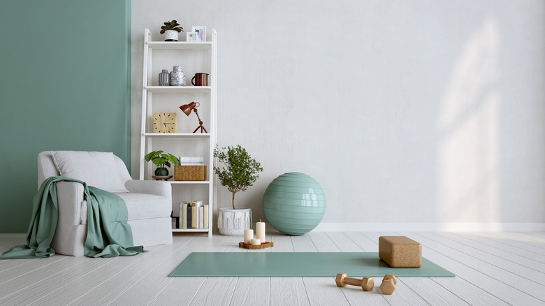 teal and white yoga room