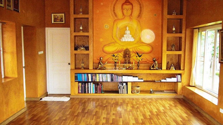 Yoga room with buddha art