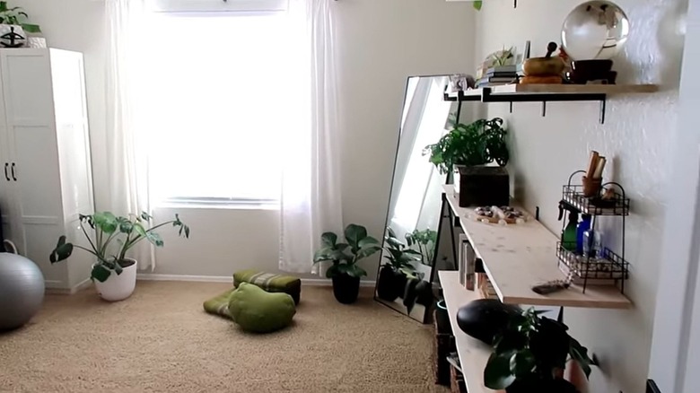 yoga room with greenery