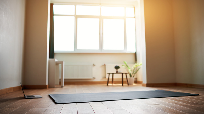 bright room with yoga mat