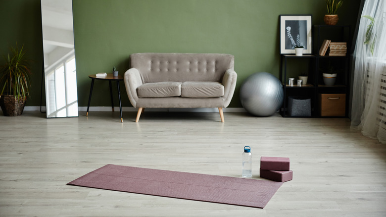yoga room with couch