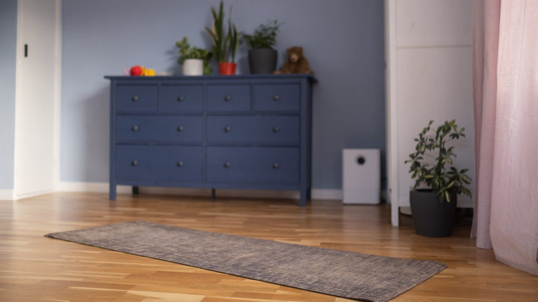 a yoga mat and dresser