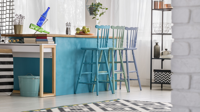 blue island with mismatched stools