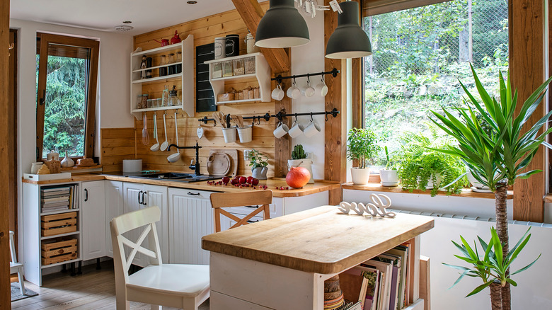 wooden wall behind open shelving