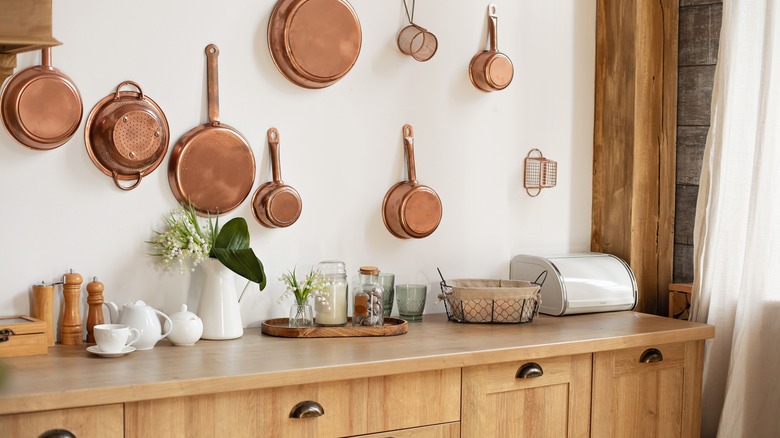 hanging copper pots in kitchen