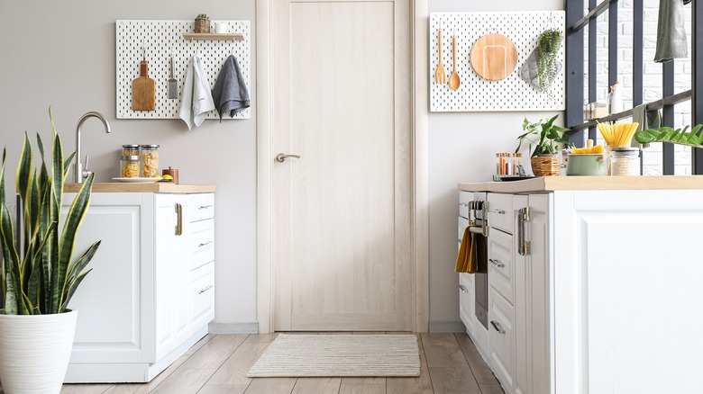 pegboards along kitchen wall