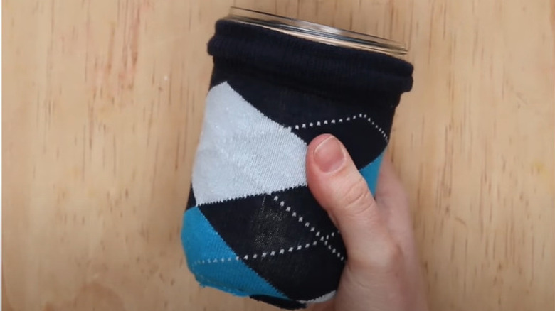 item holder in black sock