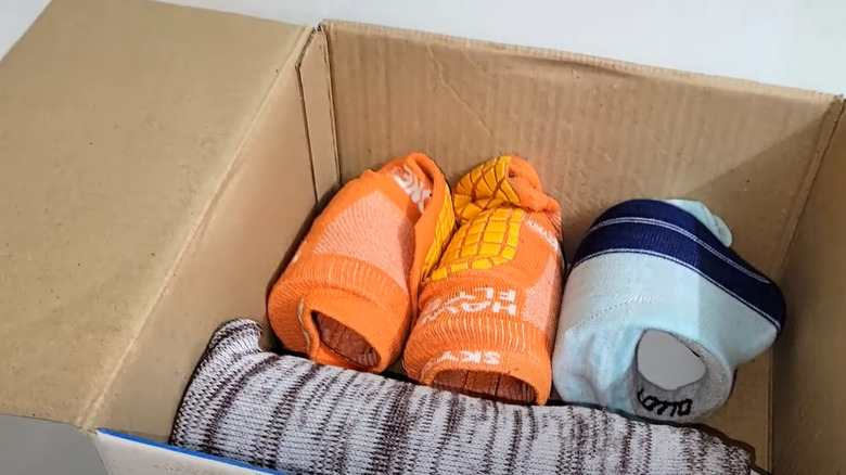 box with sock-secured items