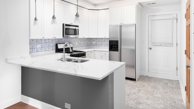 blue patterned kitchen backsplash tiles