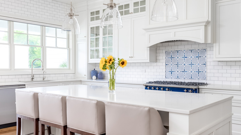 blue patterned tile above stove