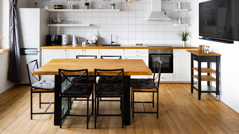 white tiles covering kitchen wall