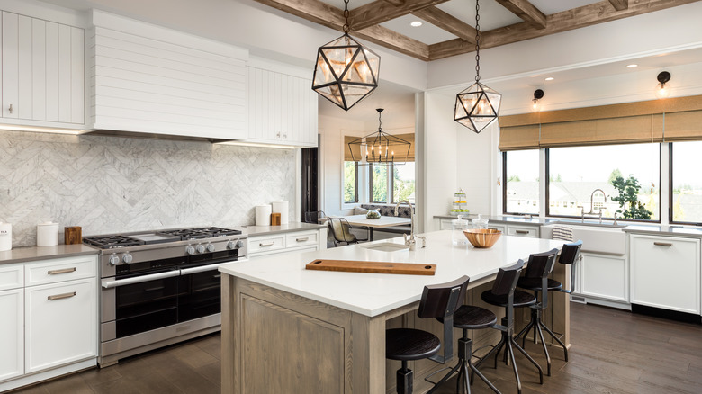 gray herringbone kitchen backsplash