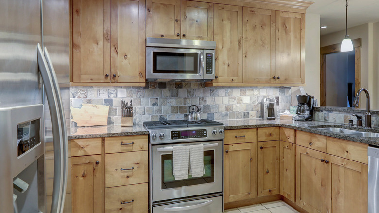 multi colored square stone backsplash