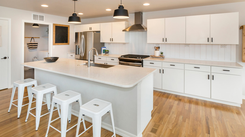 white shiplap kitchen backsplash