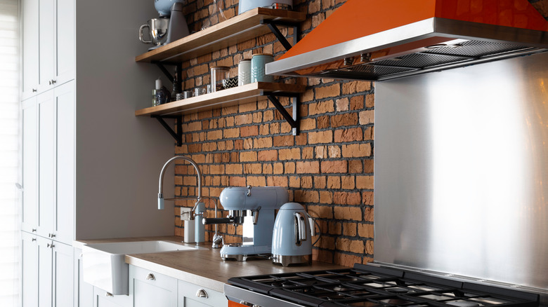 red brick wall in kitchen